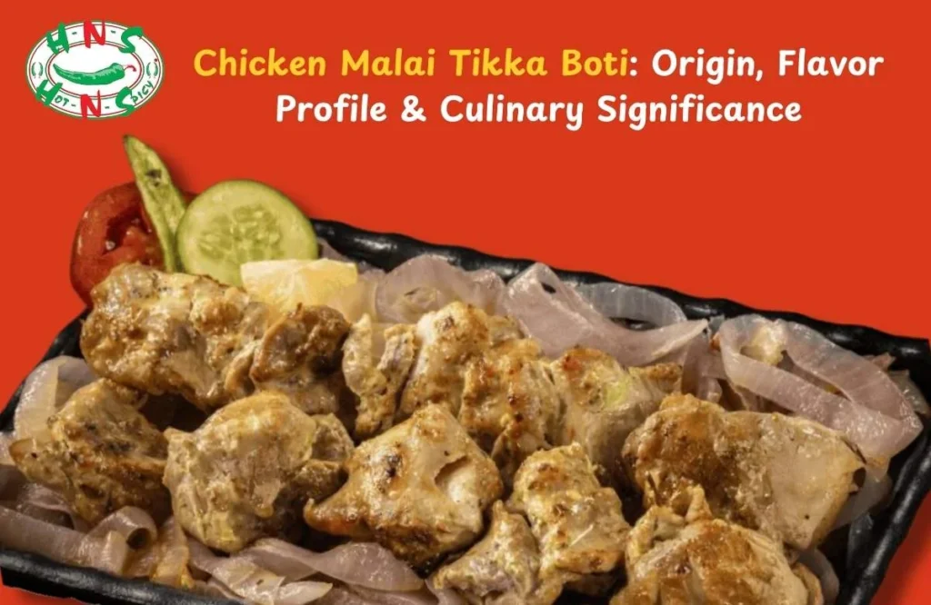 Delicious chicken malai tikka boti served hot with spices and garnishes on a plate.